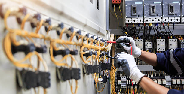Professional Electrician technician working in Vinings, GA